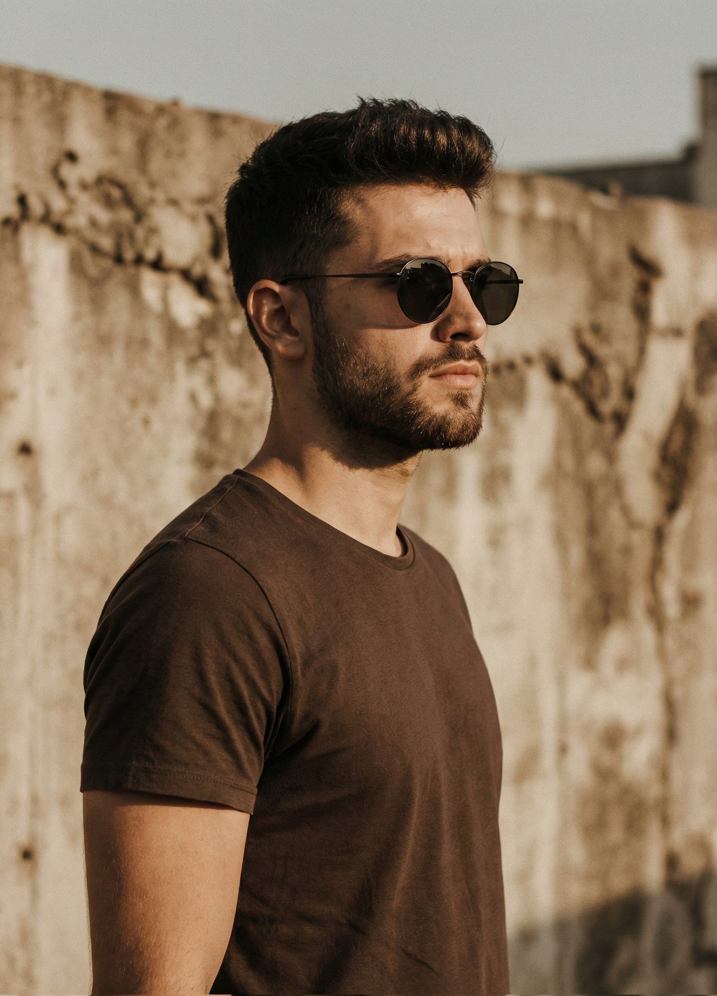 A cinematic portrait of a handsome man with a short styled ha...