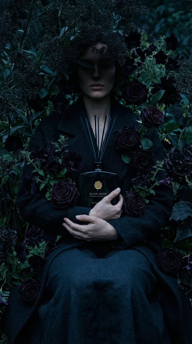 Ultra realistic luxury product photography of a black glass r...