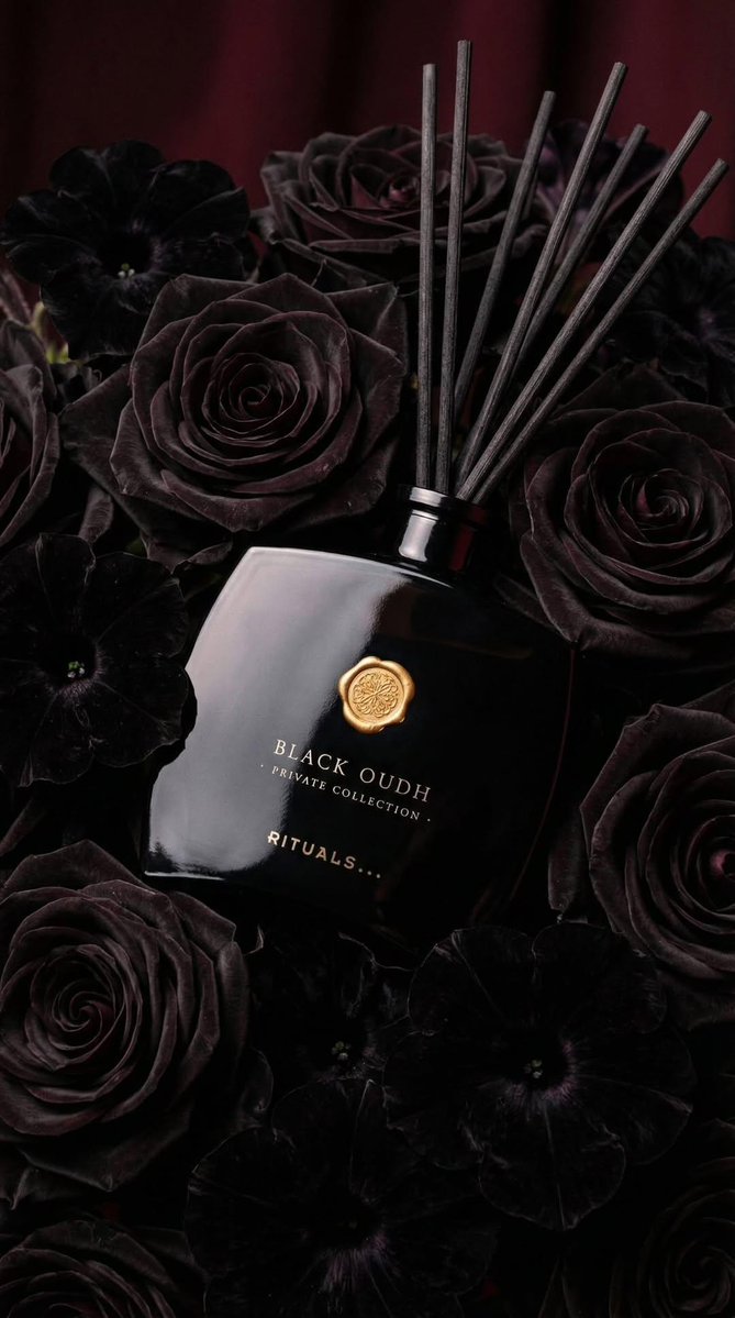 Ultra realistic luxury product photography of a black glass r...