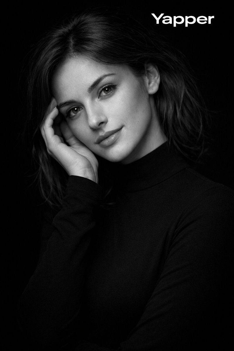 "prompt": "High contrast monochromatic studio portrait of a E...